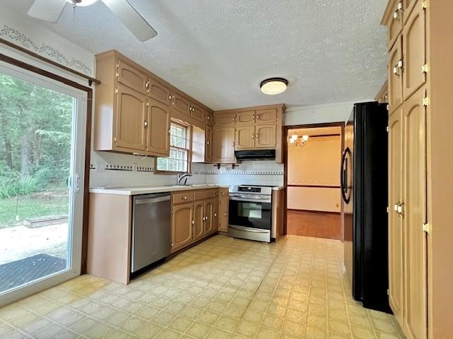 4541 Arcado Road Southwest Lilburn, GA 30047 - Photo 7 of 16 a kitchen with a refrigerator sink and cabinets