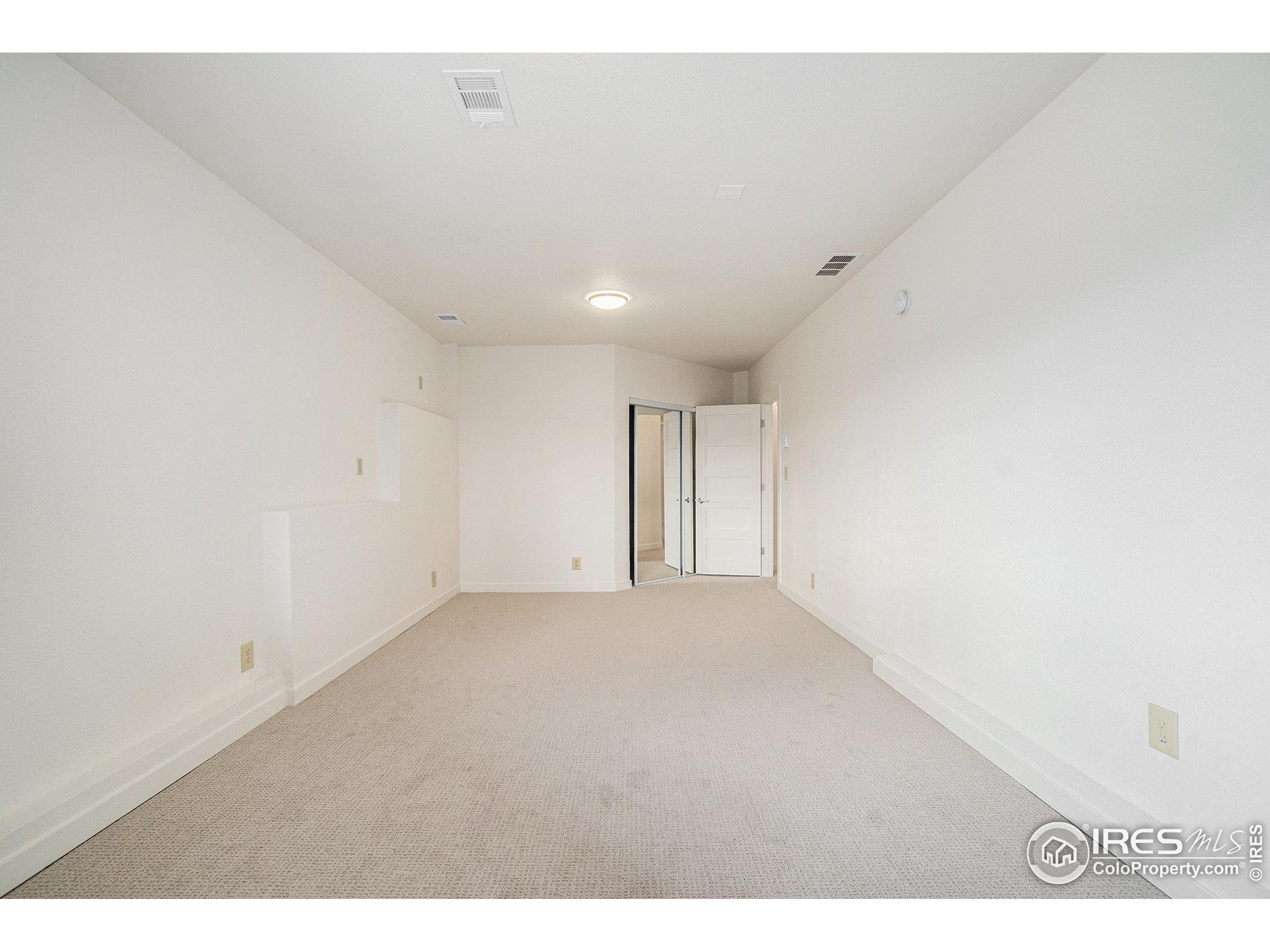 552 Blue Grouse Lane Bellvue, CO 80512 - Photo 20 of 39 a view of an empty room