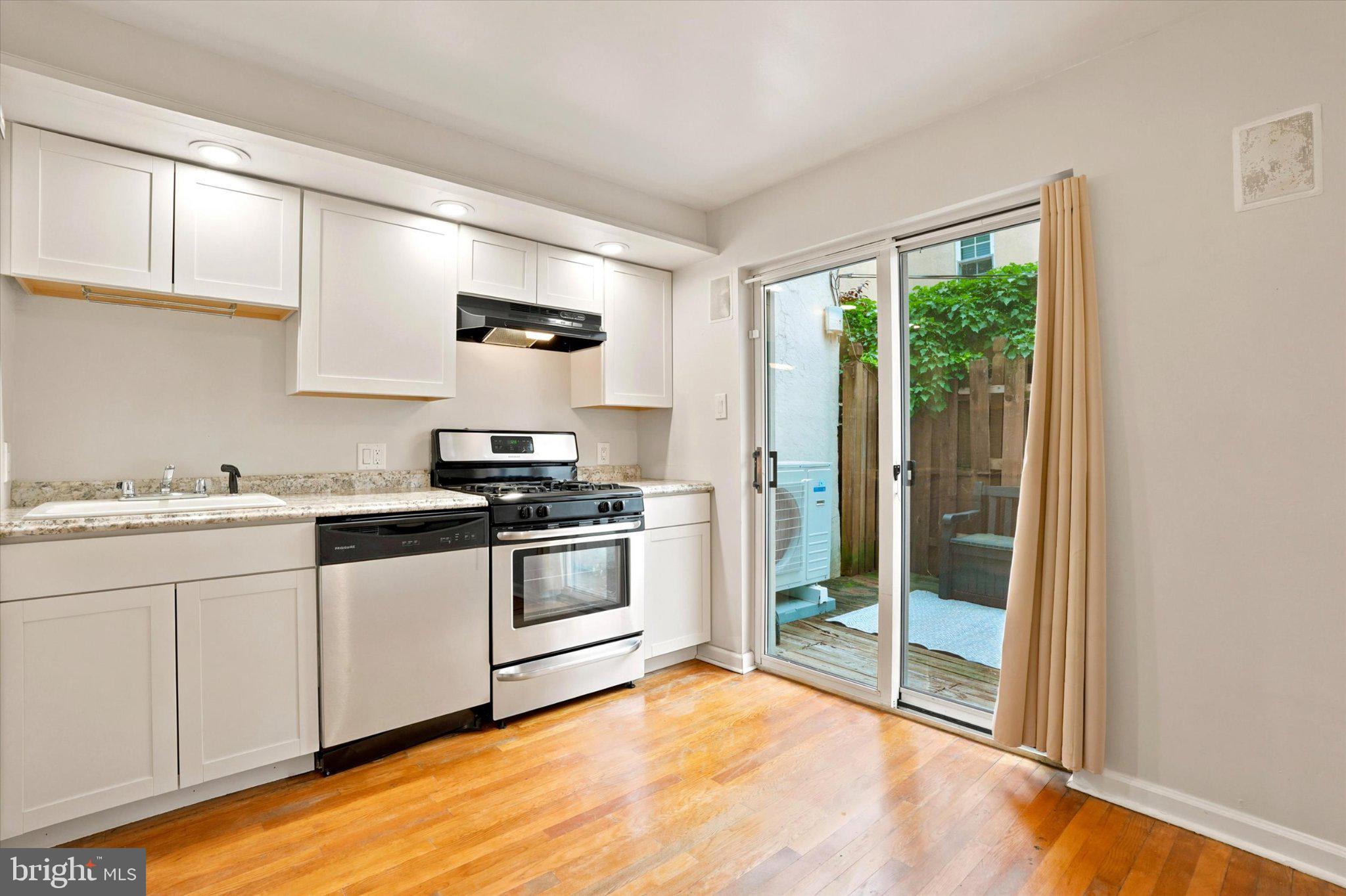 330 Monroe Street Philadelphia, PA 19147 - Photo 9 of 33 Bright kitchen with outdoor access.