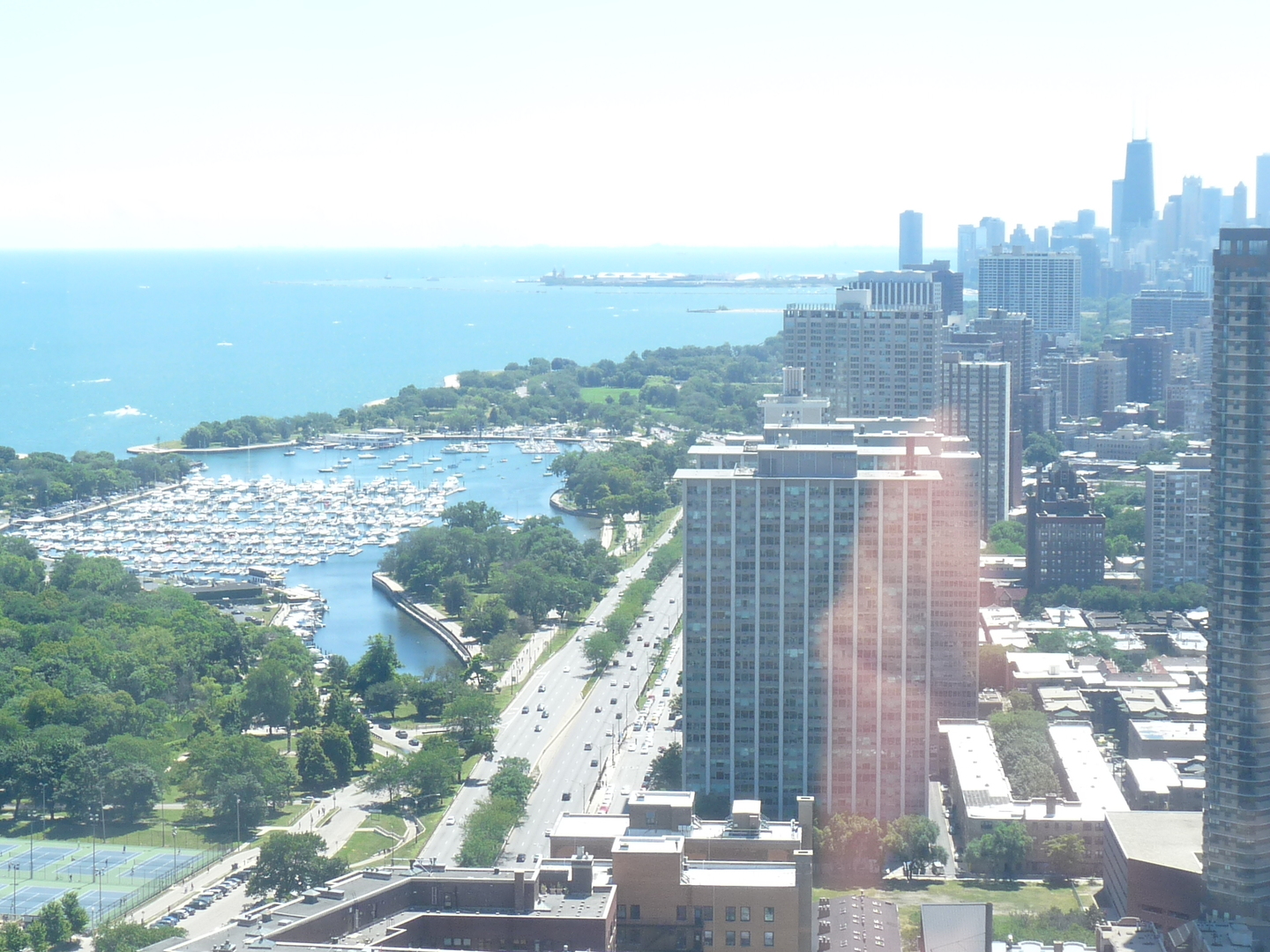 655 West Irving Park Road, Unit 5015 Chicago, IL 60613 - Photo 19 of 25 a view of a city with tall buildings