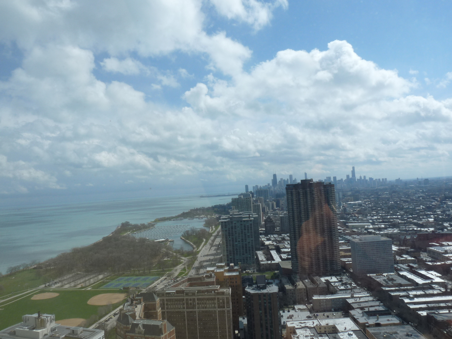 655 West Irving Park Road, Unit 5015 Chicago, IL 60613 - Photo 22 of 25 a view of a lake with a city