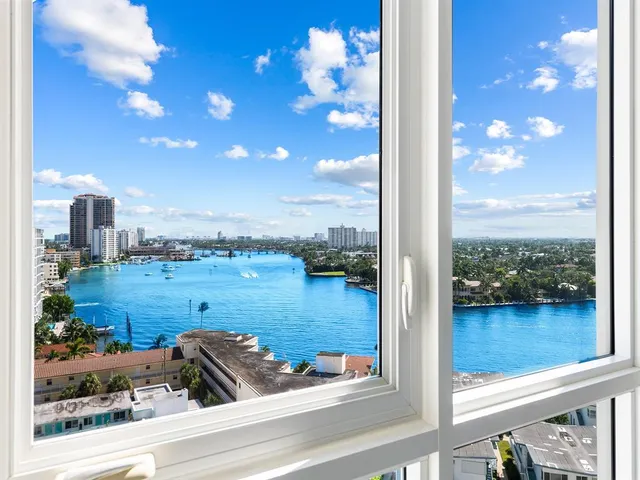 a view of a lake from a balcony
