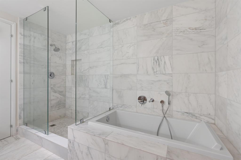 401 North Birch Road, Unit 1102 Fort Lauderdale, FL 33304 - Photo 22 of 31 a bathroom with a bathtub and shower