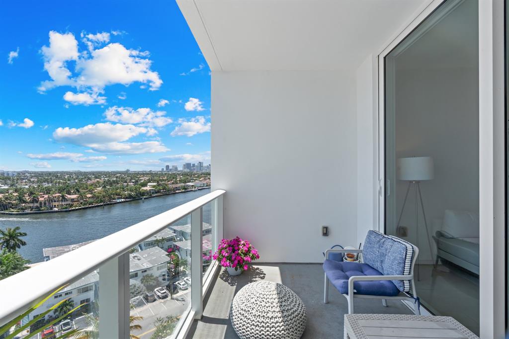 401 North Birch Road, Unit 1102 Fort Lauderdale, FL 33304 - Photo 24 of 31 a balcony with furniture and a potted plant
