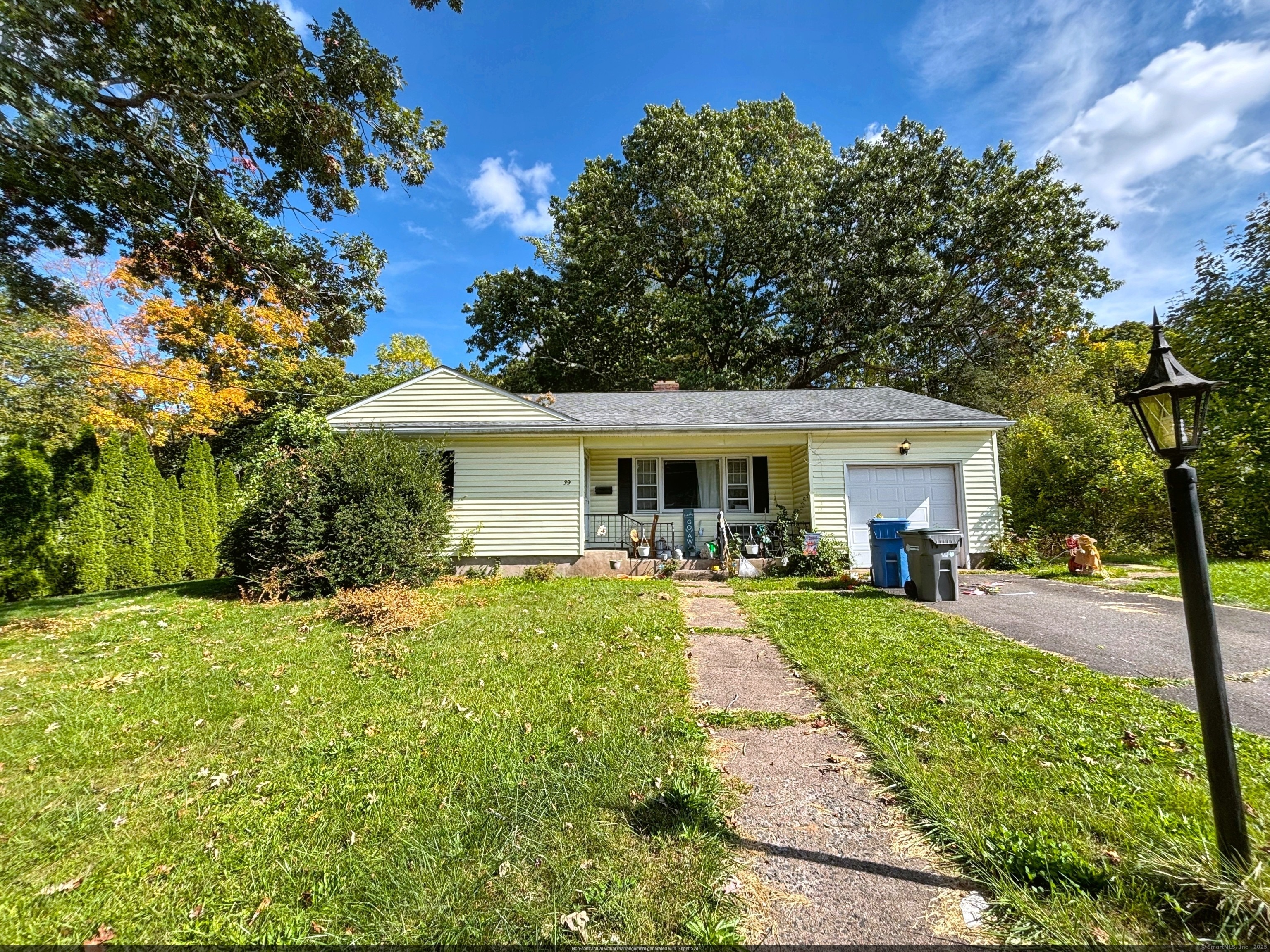 a front view of a house with swimming pool having outdoor seating