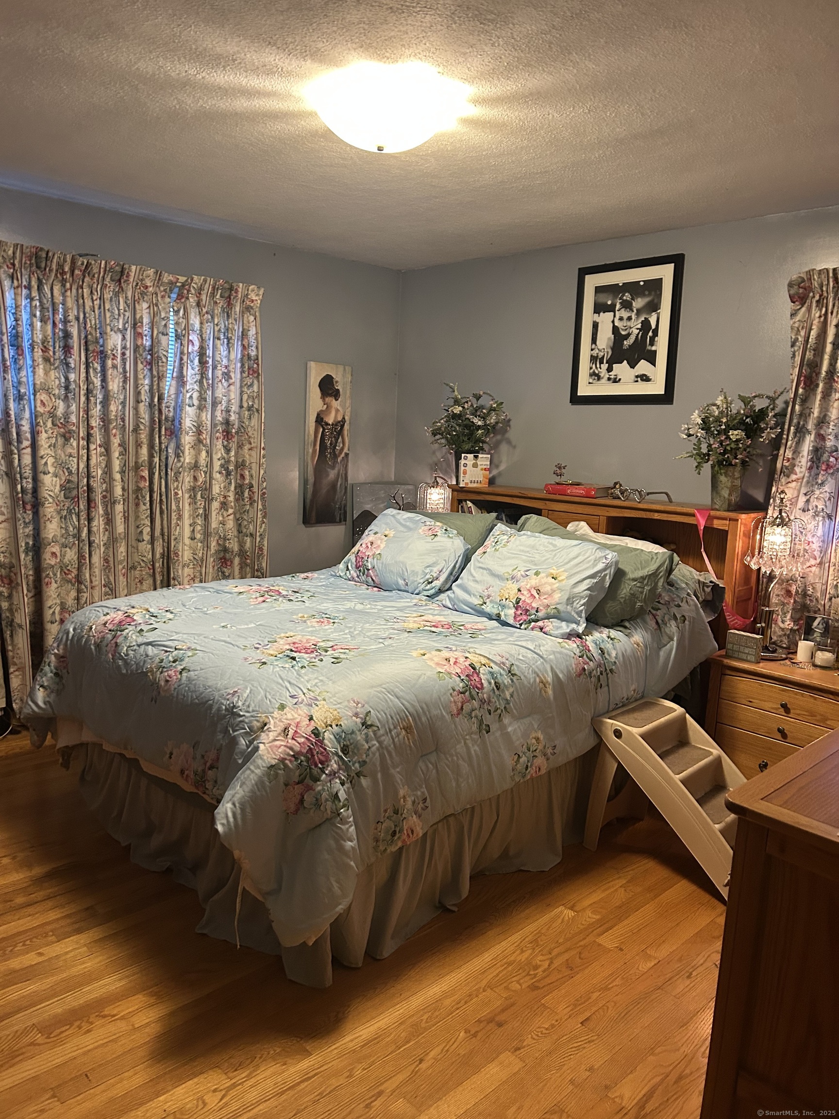 39 Alice Drive Manchester, CT 06042 - Photo 11 of 15 a bed sitting in a bedroom next to a window