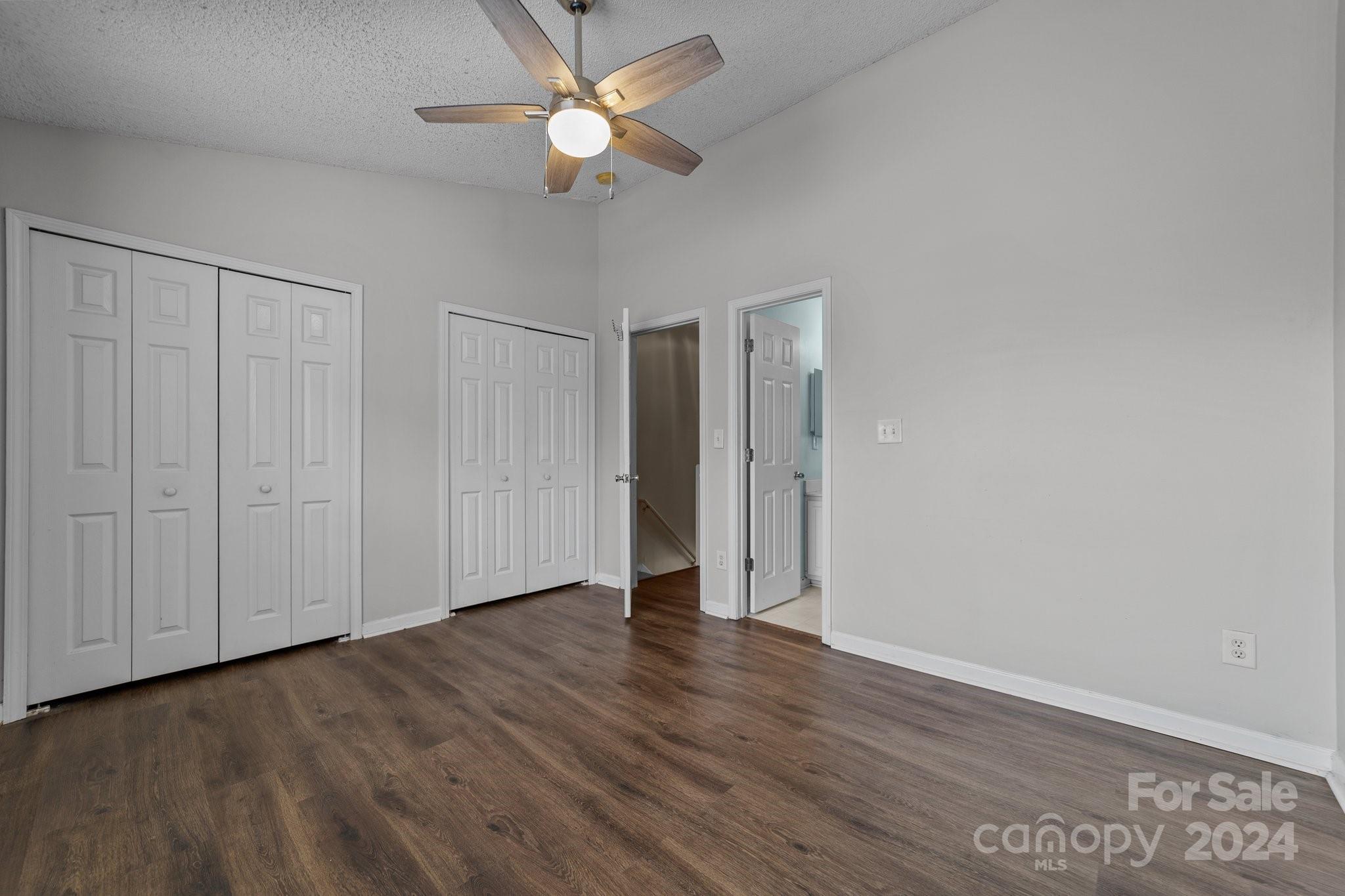 8368 Rudolph Road Charlotte, NC 28216 - Photo 26 of 43 wooden floor in an empty room