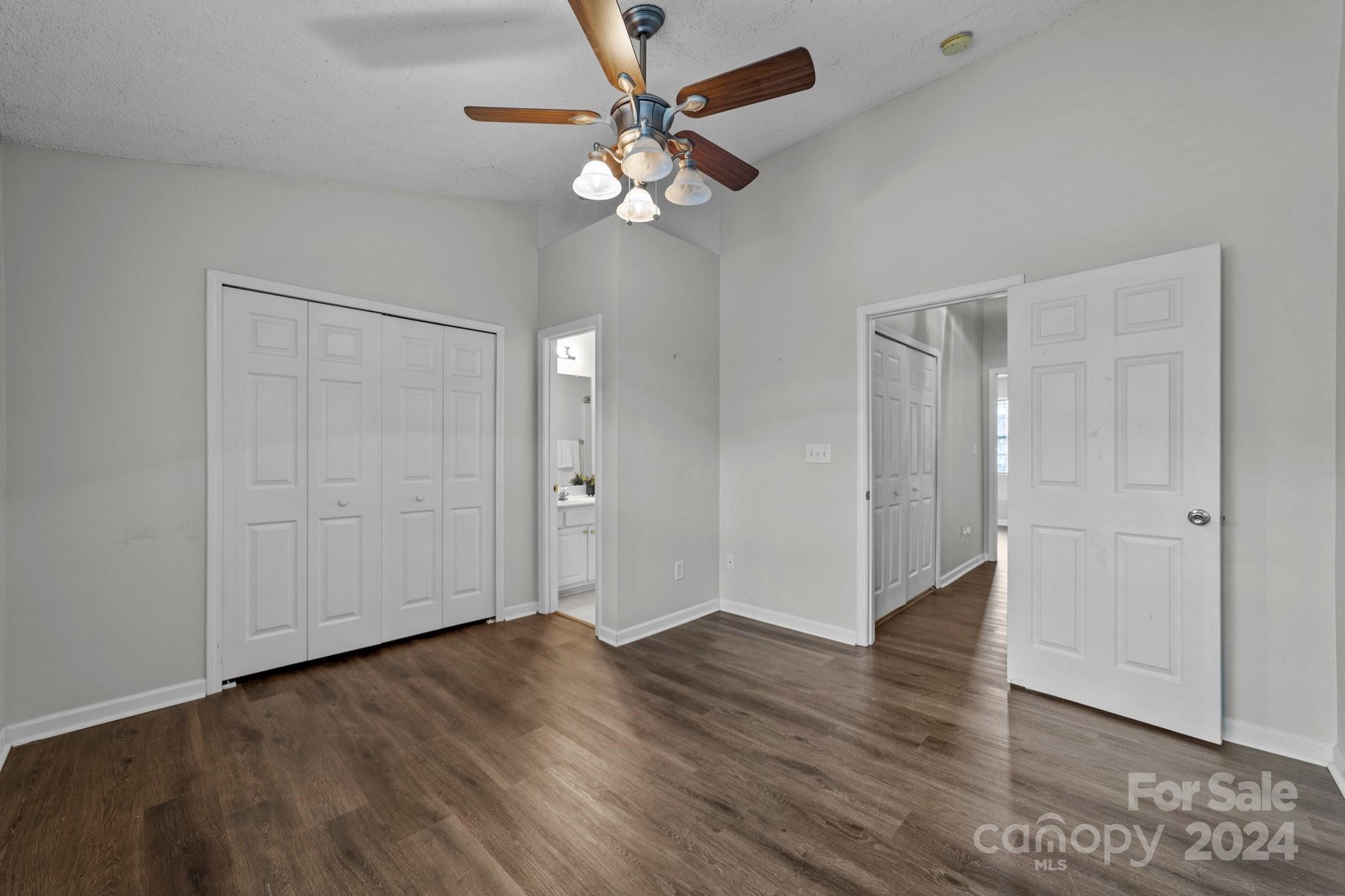 8368 Rudolph Road Charlotte, NC 28216 - Photo 29 of 43 a view of an empty room with wooden floor