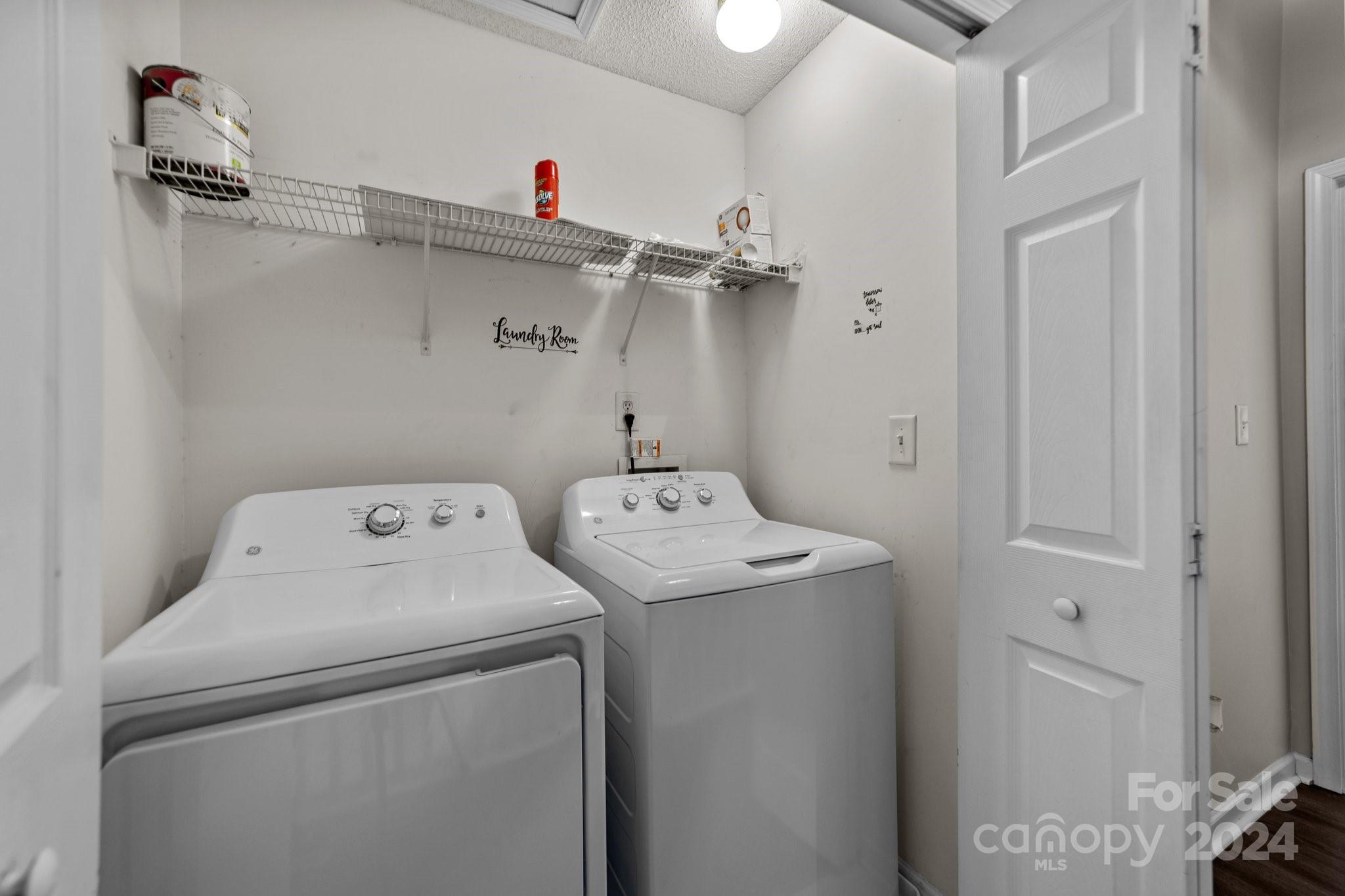 8368 Rudolph Road Charlotte, NC 28216 - Photo 31 of 43 a utility room with dryer and washer