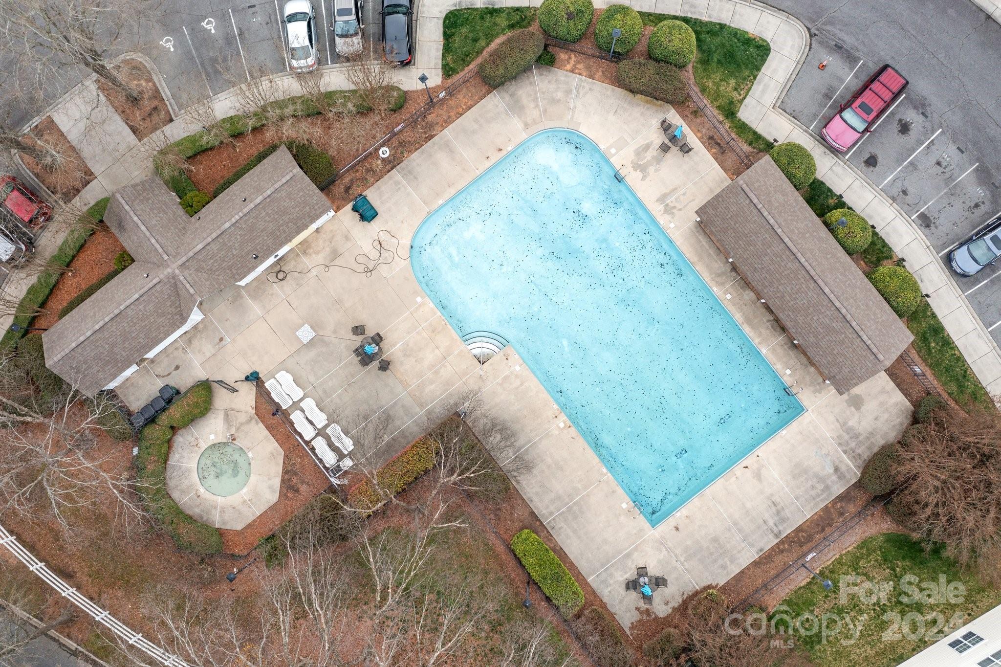 8368 Rudolph Road Charlotte, NC 28216 - Photo 32 of 43 an aerial view of a house with a swimming pool