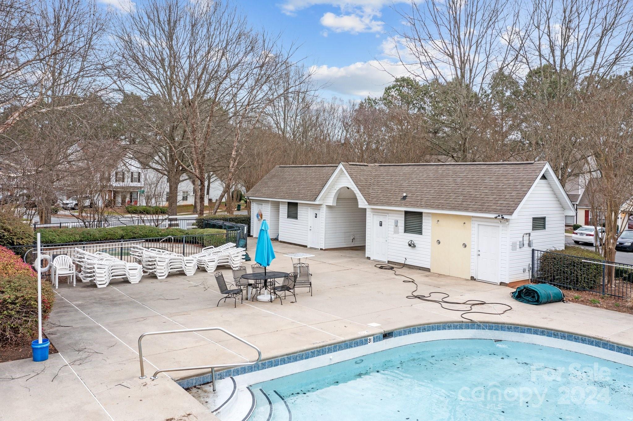 8368 Rudolph Road Charlotte, NC 28216 - Photo 40 of 43 a view of a house with backyard and sitting area