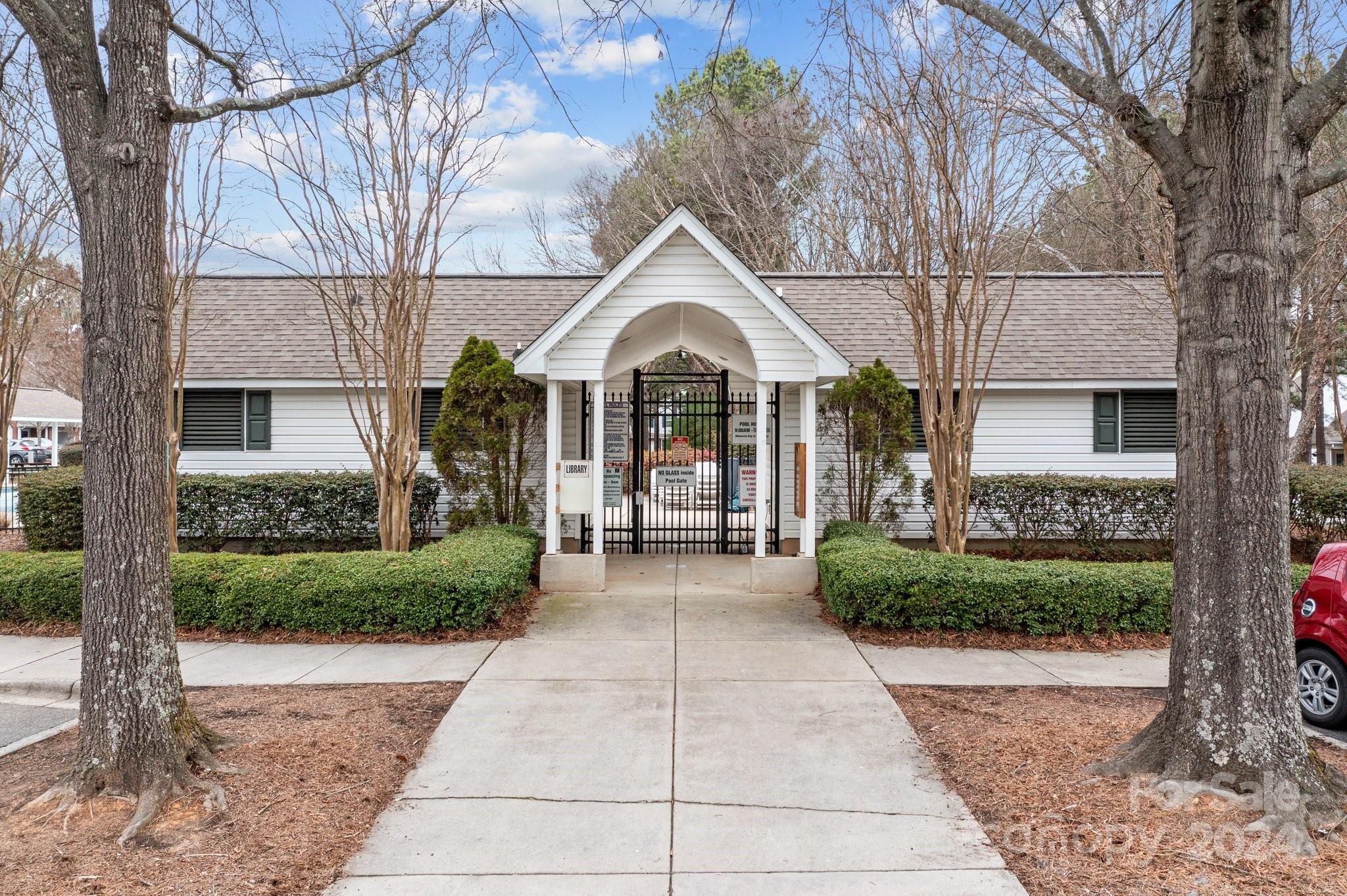 8368 Rudolph Road Charlotte, NC 28216 - Photo 41 of 43 a view of a house with a yard
