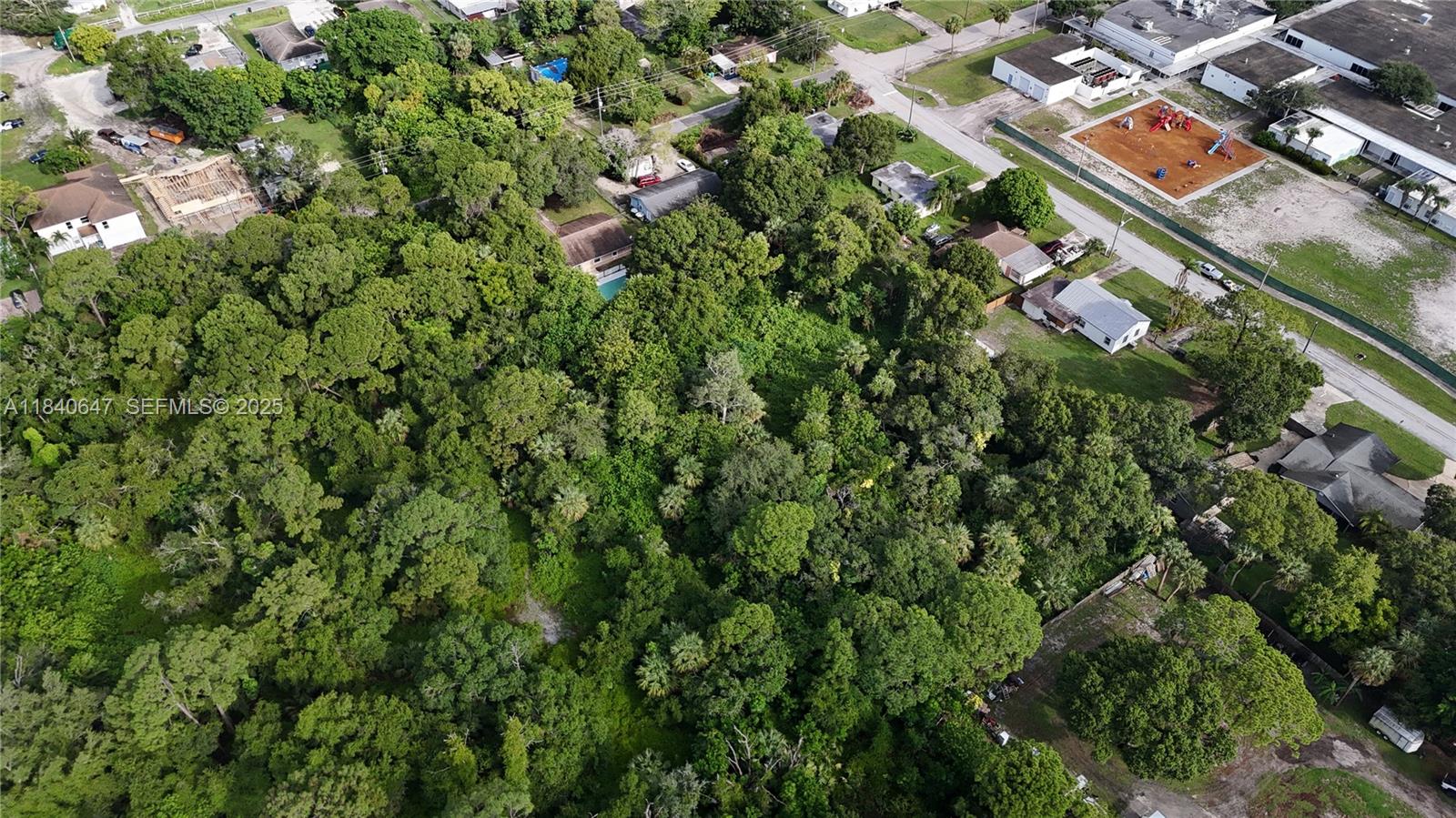 1 Tennessee Avenue Fort Pierce, FL 34947 - Photo 15 of 17 an aerial view of residential building with green space