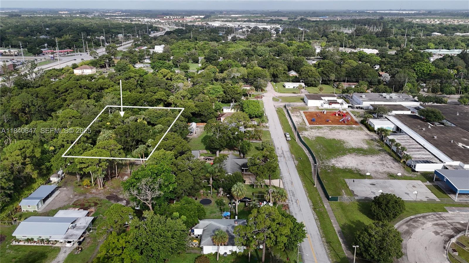 1 Tennessee Avenue Fort Pierce, FL 34947 - Photo 3 of 17 an aerial view of multiple house
