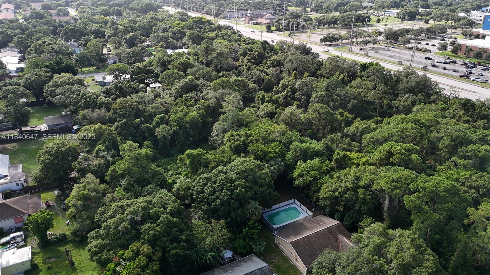 1 Tennessee Avenue Fort Pierce, FL 34947 - Photo 8 of 17 an aerial view of a house with a yard