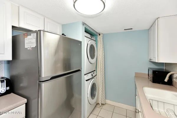a bathroom with a shower and a mirror