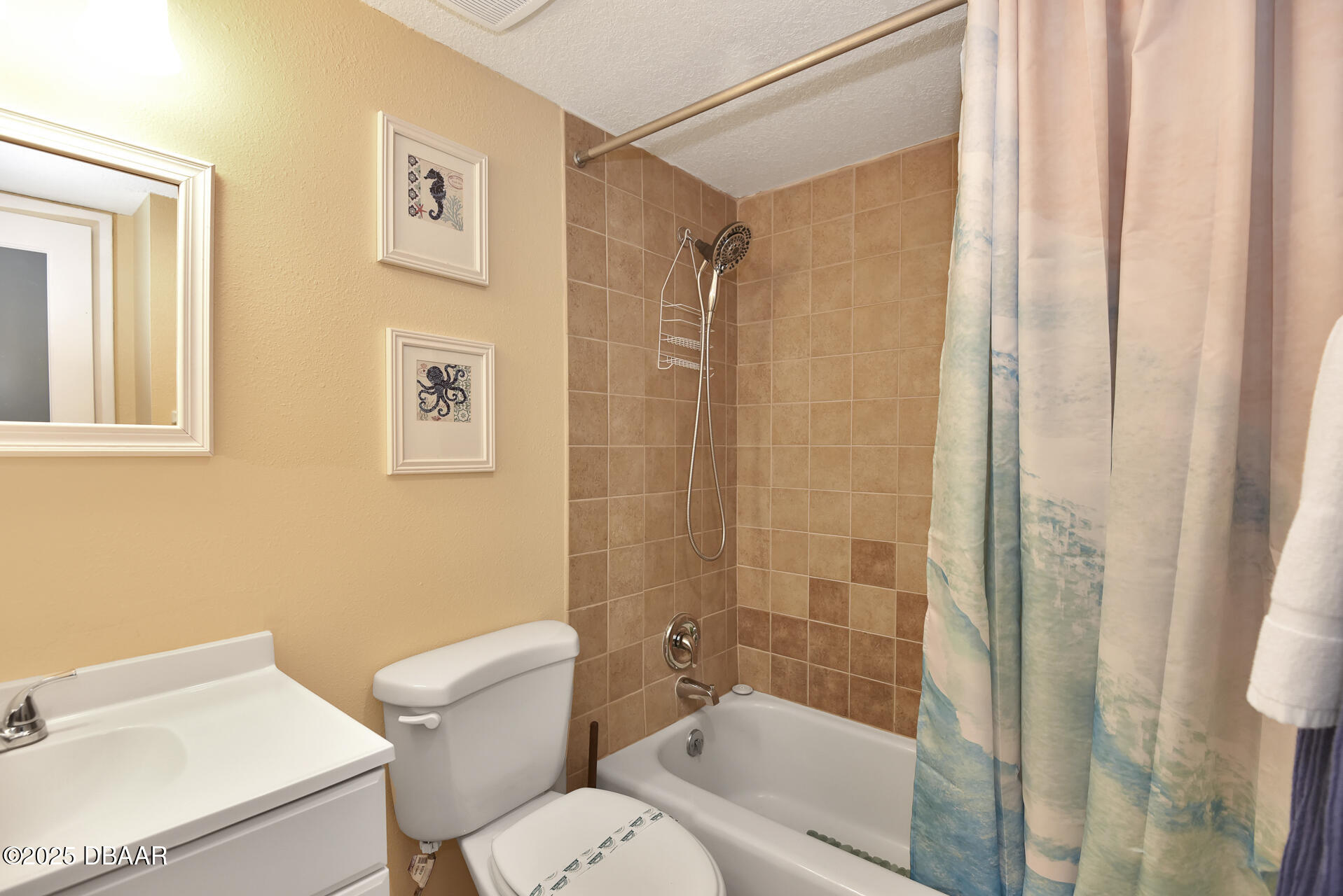 4495 South Atlantic Avenue, Unit 4040 Ponce Inlet, FL 32127 - Photo 19 of 45 a bathroom with a toilet a sink and a shower