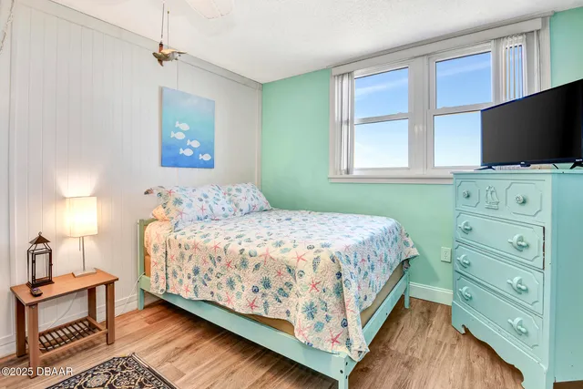 a view of an ocean with a beach