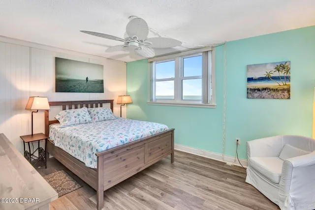 a view of balcony with wooden floor