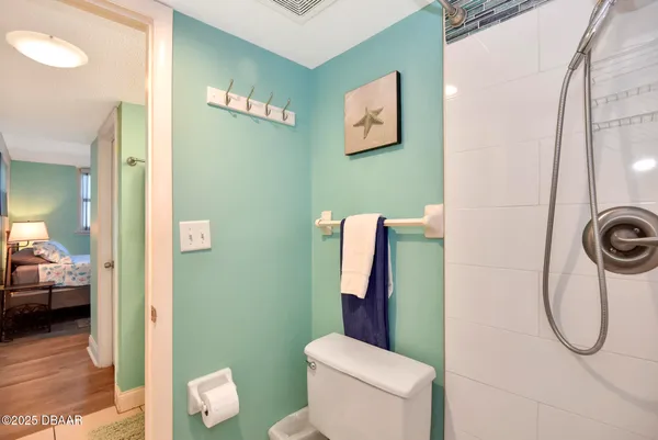a bathroom with a toilet and a sink