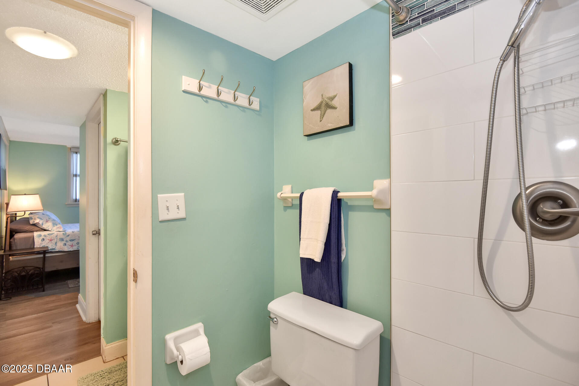 4495 South Atlantic Avenue, Unit 4040 Ponce Inlet, FL 32127 - Photo 32 of 45 a bathroom with a toilet and a sink