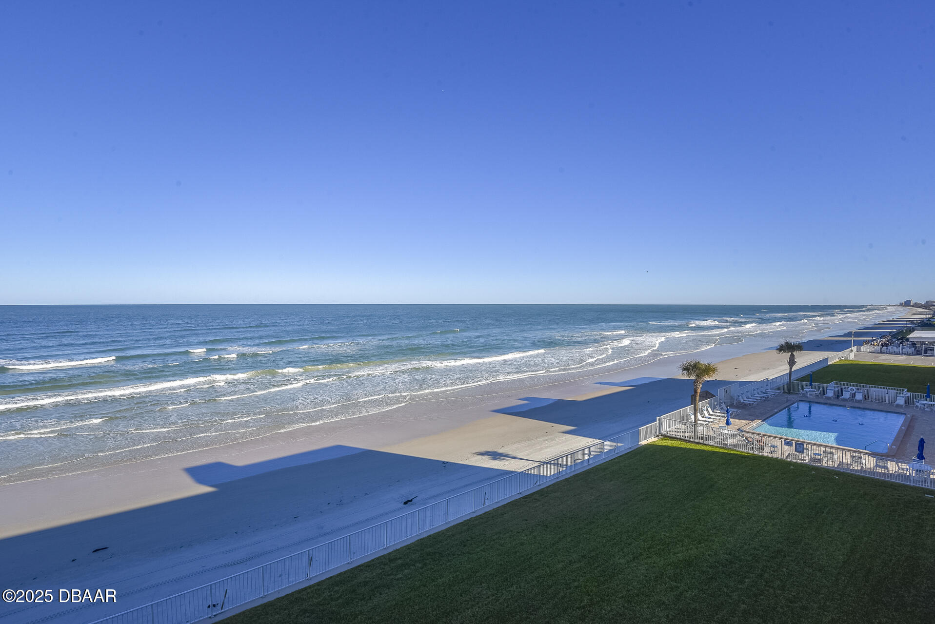 4495 South Atlantic Avenue, Unit 4040 Ponce Inlet, FL 32127 - Photo 35 of 45 a view of an ocean with a beach