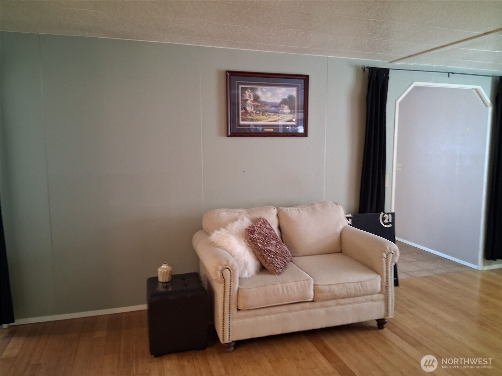 815 124th Street Southwest, Unit 36 Everett, WA 98204 - Photo 13 of 33 a living room with furniture and a wooden floor