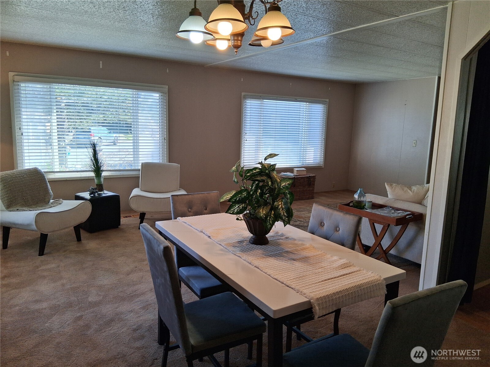 815 124th Street Southwest, Unit 36 Everett, WA 98204 - Photo 17 of 33 a view of a dining room with furniture and window