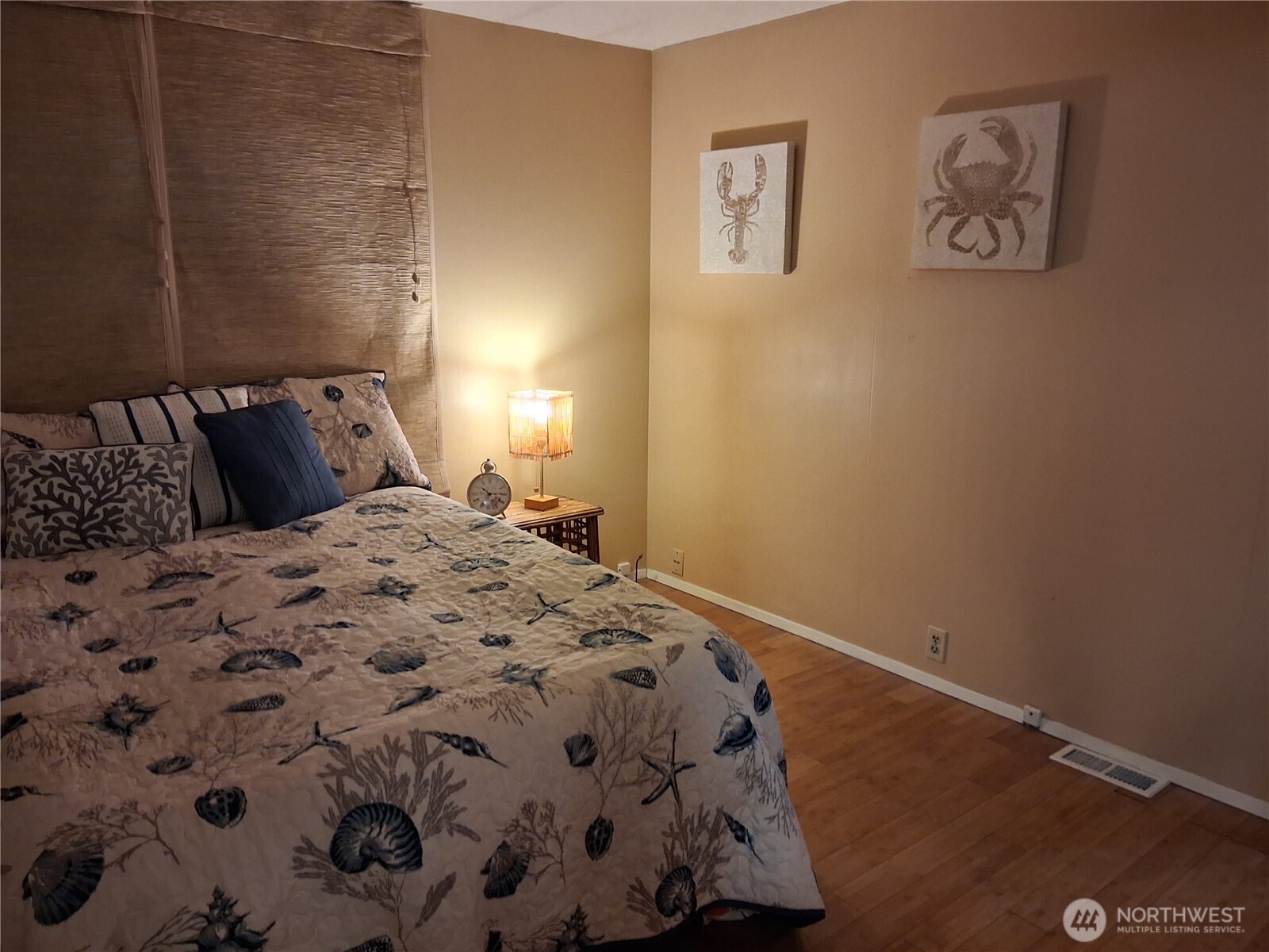 815 124th Street Southwest, Unit 36 Everett, WA 98204 - Photo 25 of 33 a large bed sitting in a bedroom next to a wall