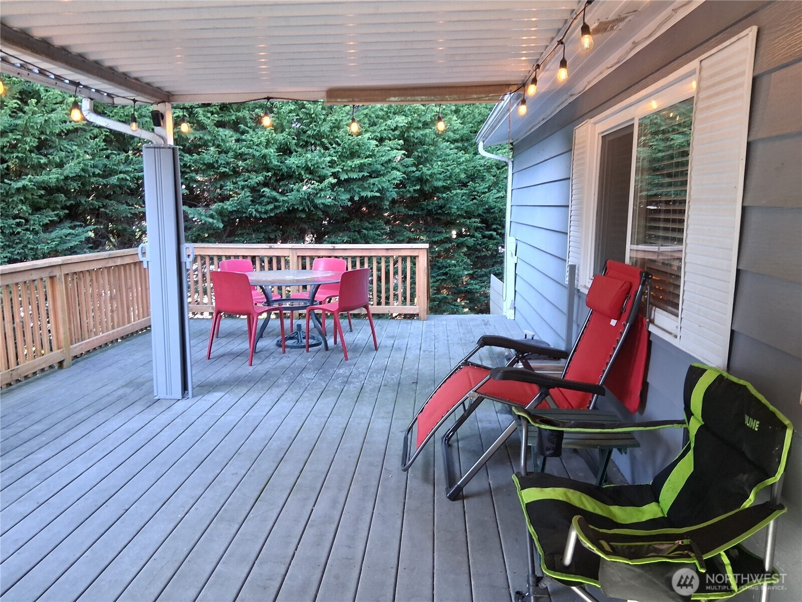 815 124th Street Southwest, Unit 36 Everett, WA 98204 - Photo 31 of 33 a patio with lawn chairs and wooden floor