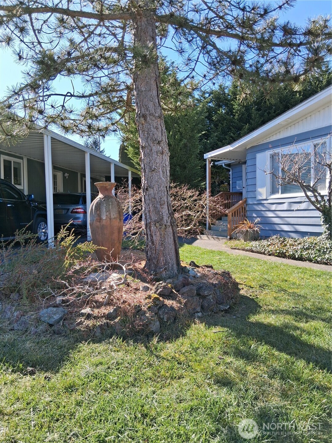 815 124th Street Southwest, Unit 36 Everett, WA 98204 - Photo 4 of 33 a view of a house with backyard from a patio