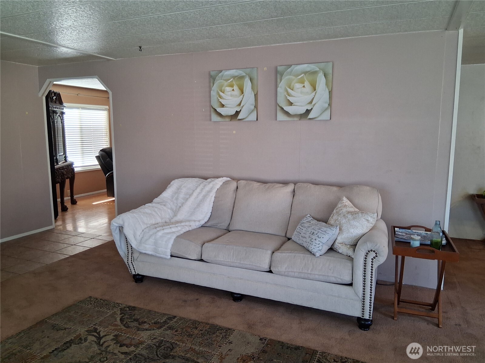 815 124th Street Southwest, Unit 36 Everett, WA 98204 - Photo 7 of 33 a living room with furniture and a table