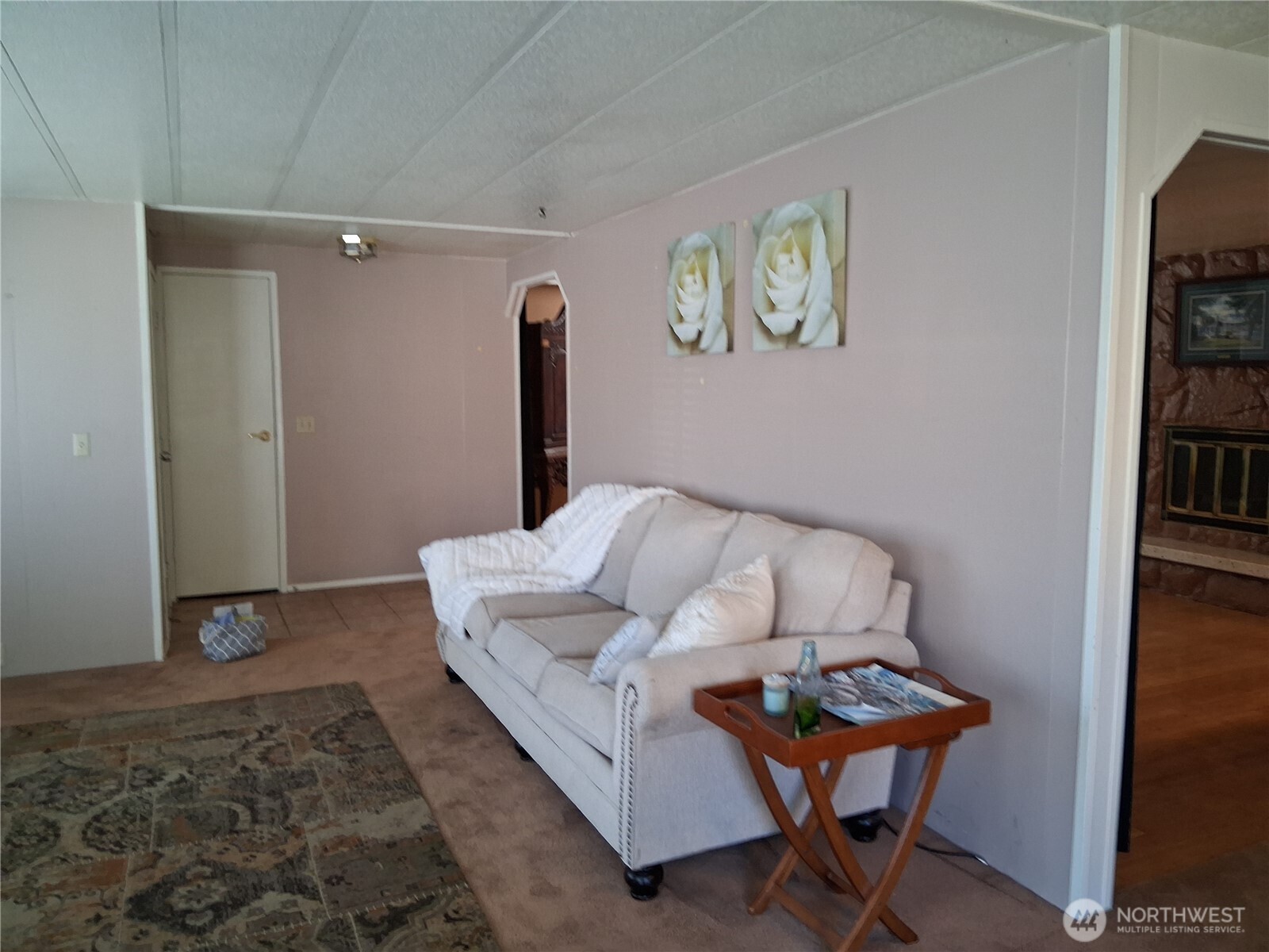 815 124th Street Southwest, Unit 36 Everett, WA 98204 - Photo 9 of 33 a living room with furniture and a rug