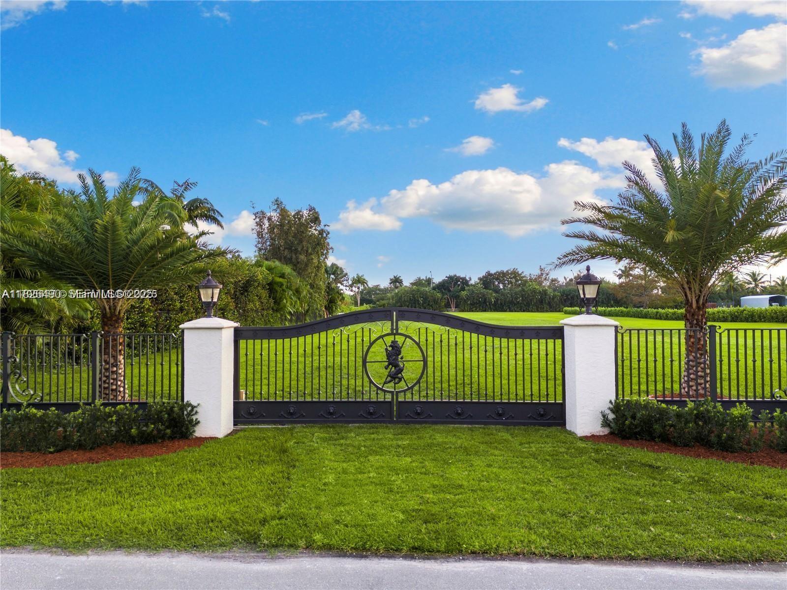 70 Southwest Pl Ranches Southwest Ranches, FL 33331 - Photo 13 of 15 a view of a park with a large trees with wooden fence