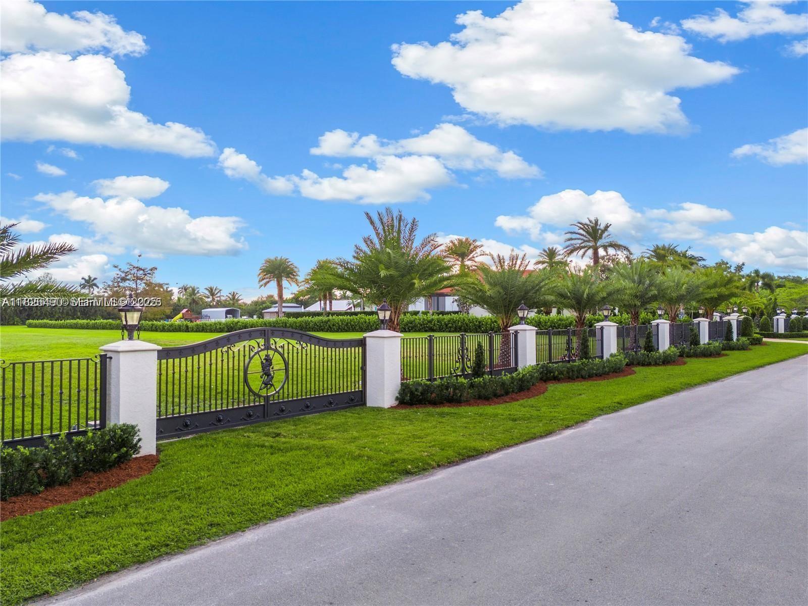 70 Southwest Pl Ranches Southwest Ranches, FL 33331 - Photo 2 of 15 a view of a house with a big yard