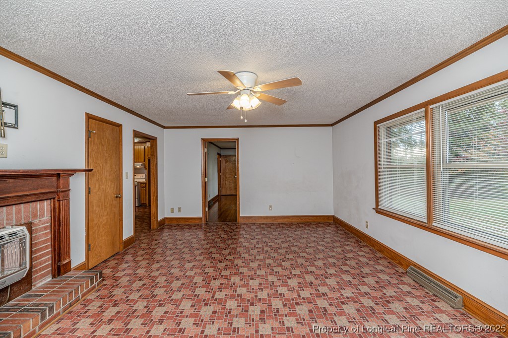 406 McFarland Road Broadway, NC 27505 - Photo 11 of 37 a view of an empty room with a window