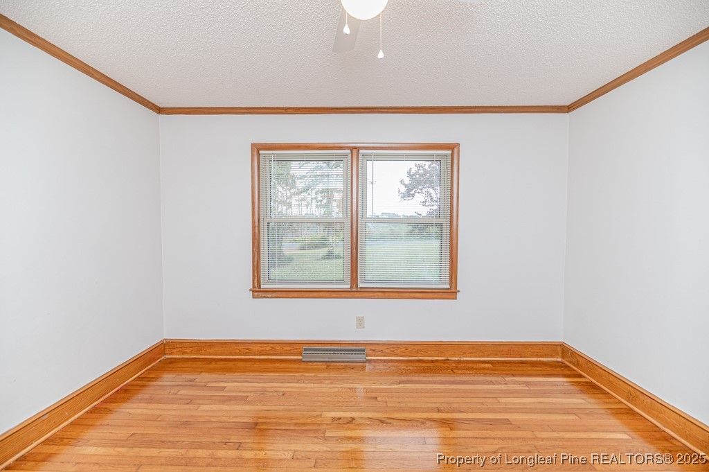 406 McFarland Road Broadway, NC 27505 - Photo 30 of 37 a view of empty room with window
