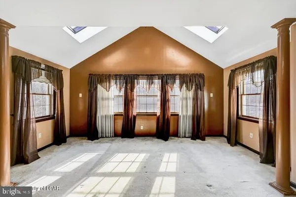 a view of a livingroom with a staircase