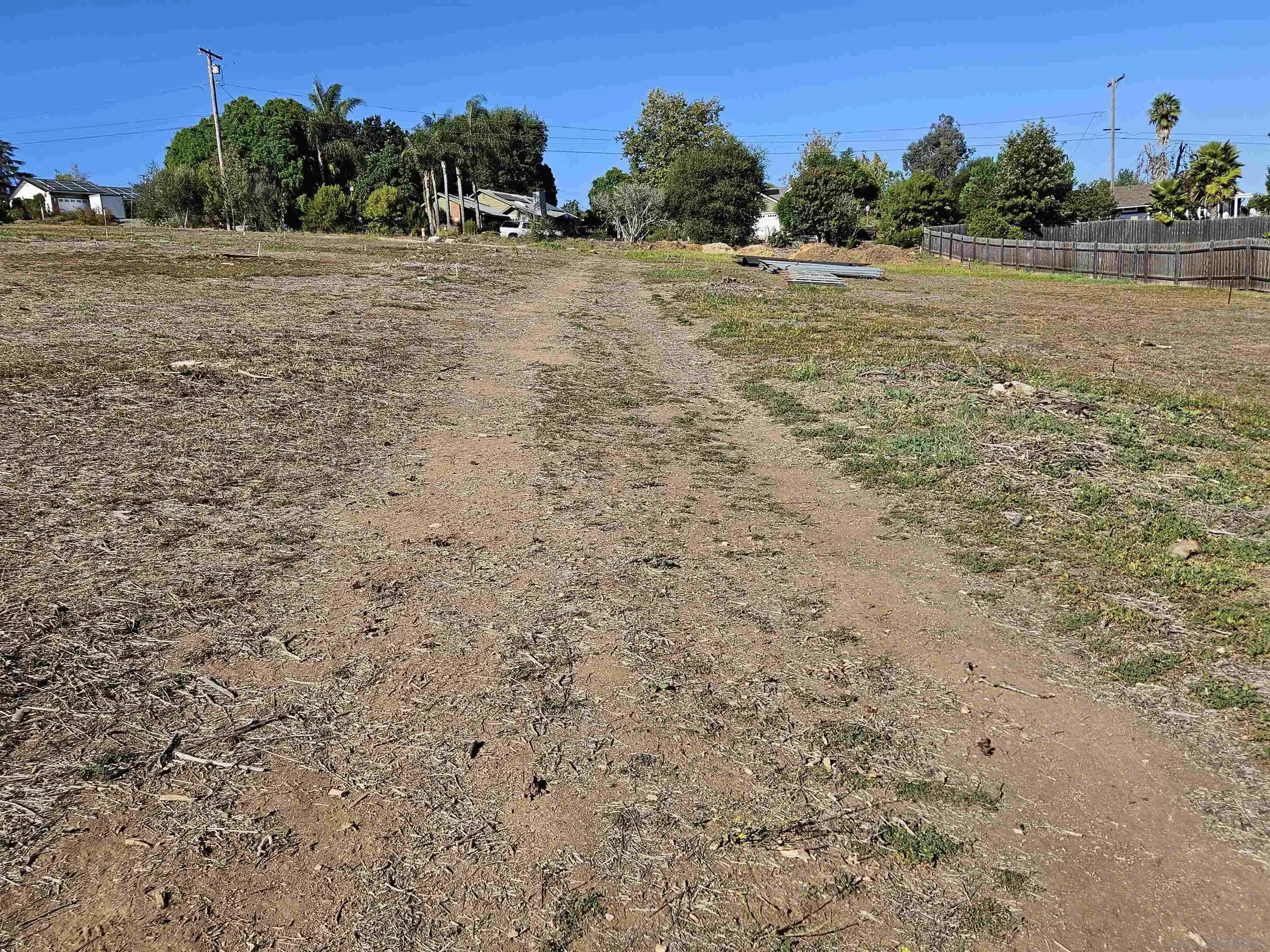 730 Constant Creek Road, Unit 1060117500 Fallbrook, CA 92028 - Photo 21 of 22 a view of a field with some trees in the background