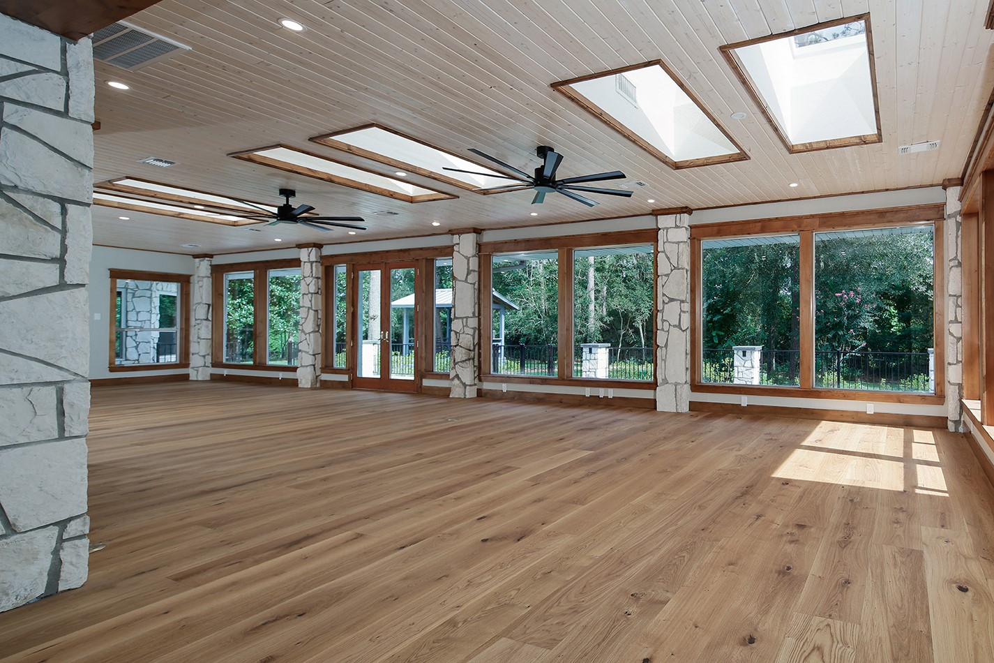 26442 McDonald Road Spring, TX 77380 - Photo 20 of 43 a view of a room with wooden floor and outdoor space