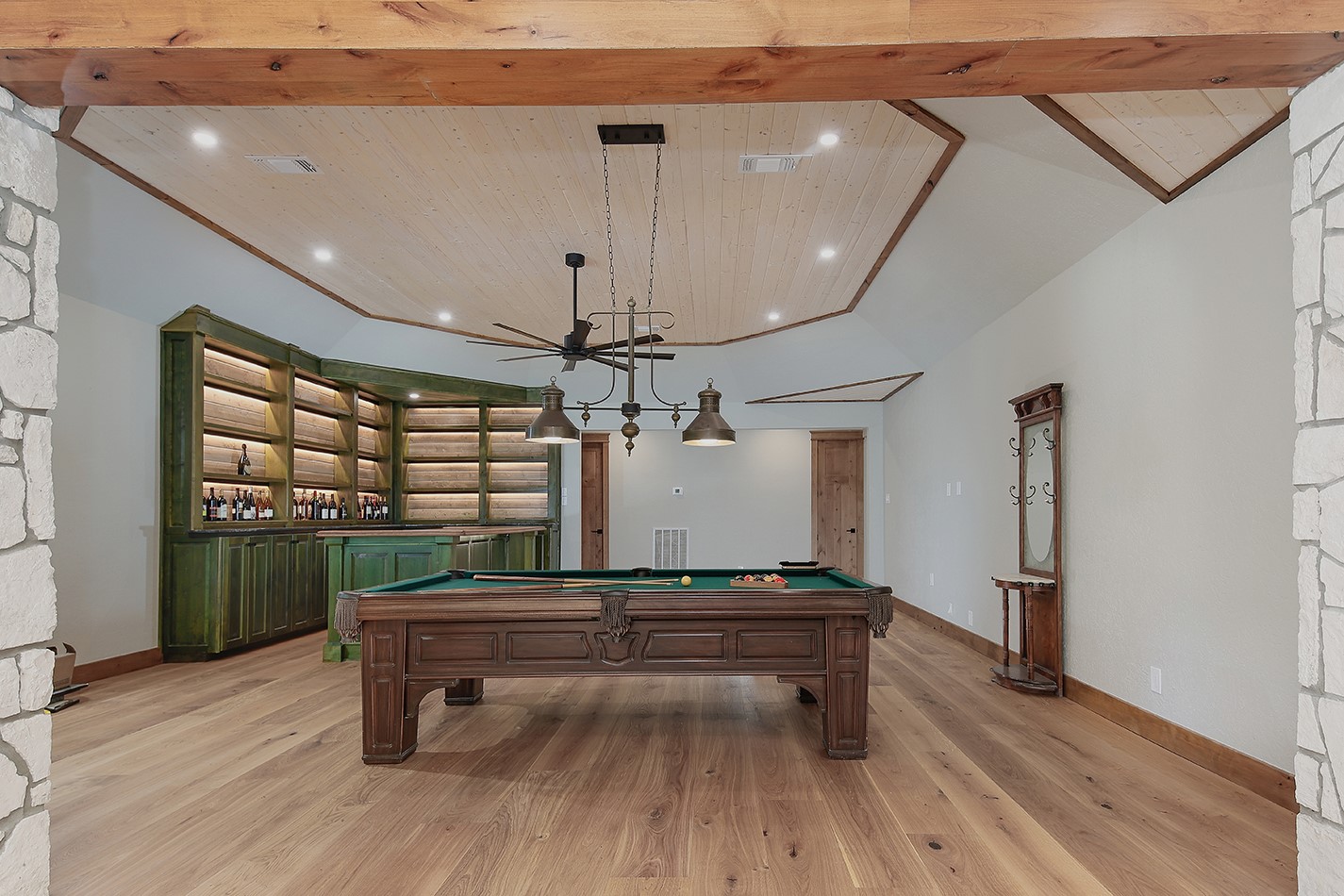 26442 McDonald Road Spring, TX 77380 - Photo 22 of 43 a room with gym equipment and wooden floor