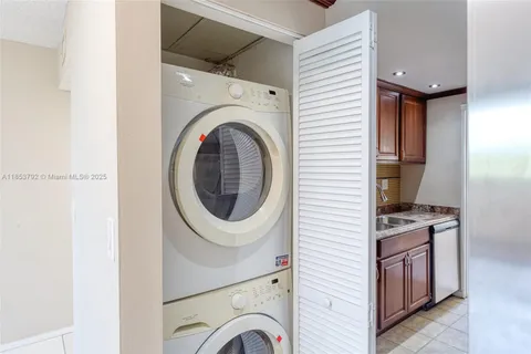 a kitchen with a stove and a microwave