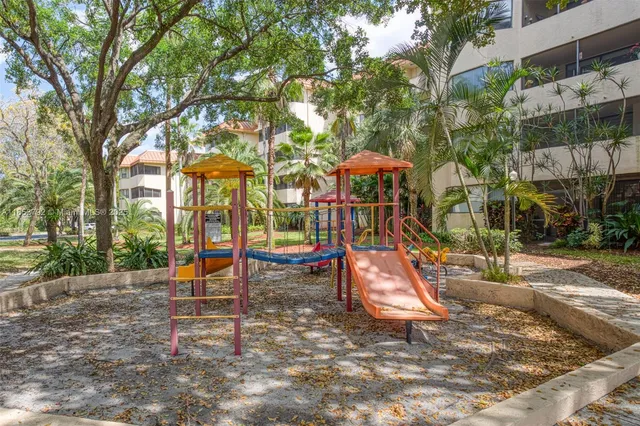 a view of a backyard with a patio