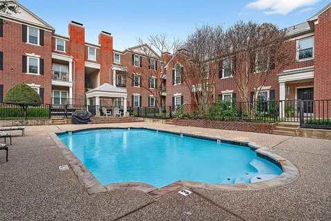 a view of pool with outdoor seating