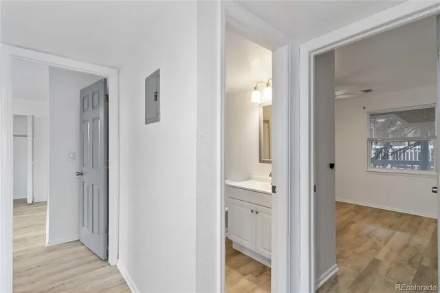 a view of a bathroom with sink and mirror