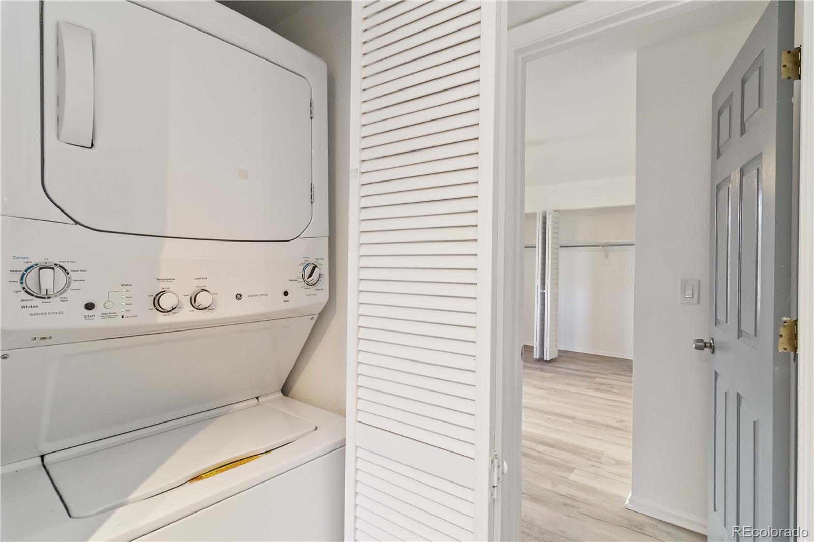 1263 South Gilbert Street, Unit B201 Castle Rock, CO 80104 - Photo 19 of 25 a utility room with dryer and washer