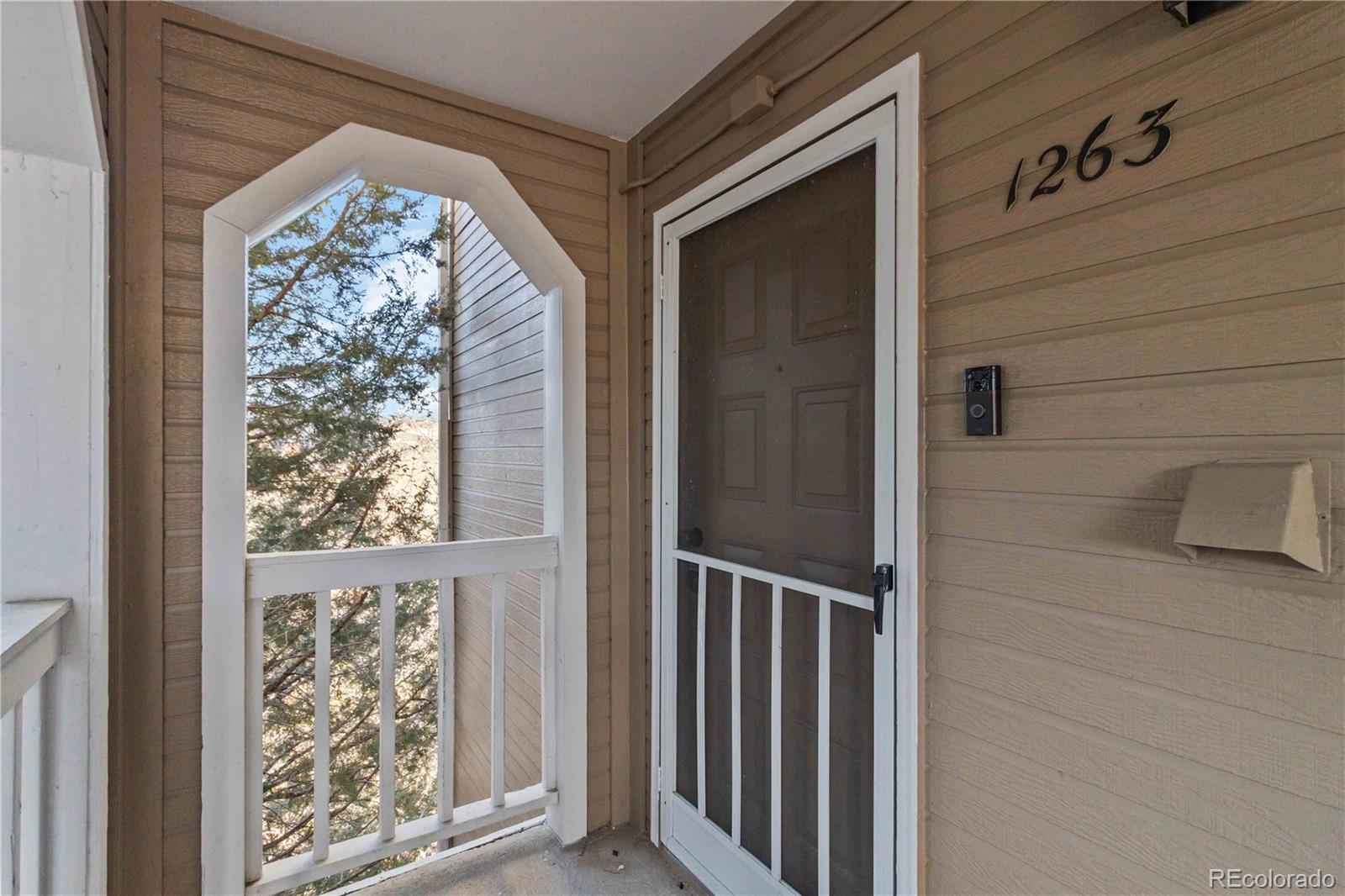 1263 South Gilbert Street, Unit B201 Castle Rock, CO 80104 - Photo 2 of 25 a view of front door