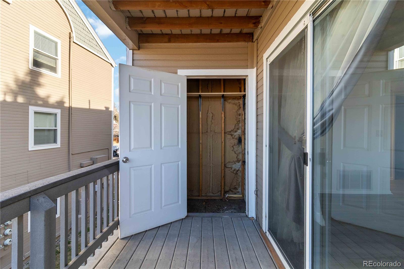 1263 South Gilbert Street, Unit B201 Castle Rock, CO 80104 - Photo 23 of 25 a view of a house with wooden floor