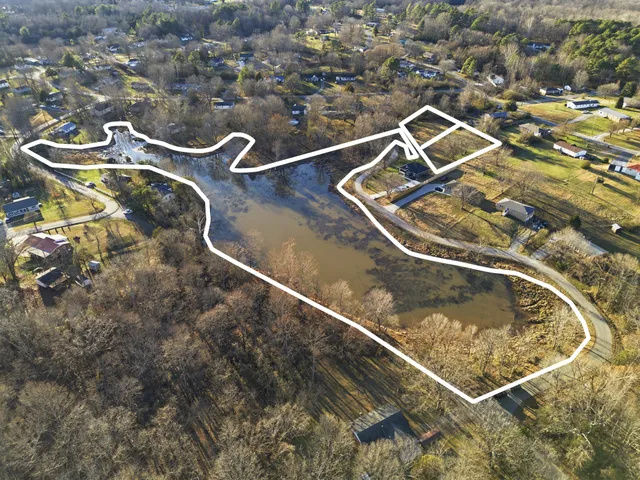 an aerial view of a pool