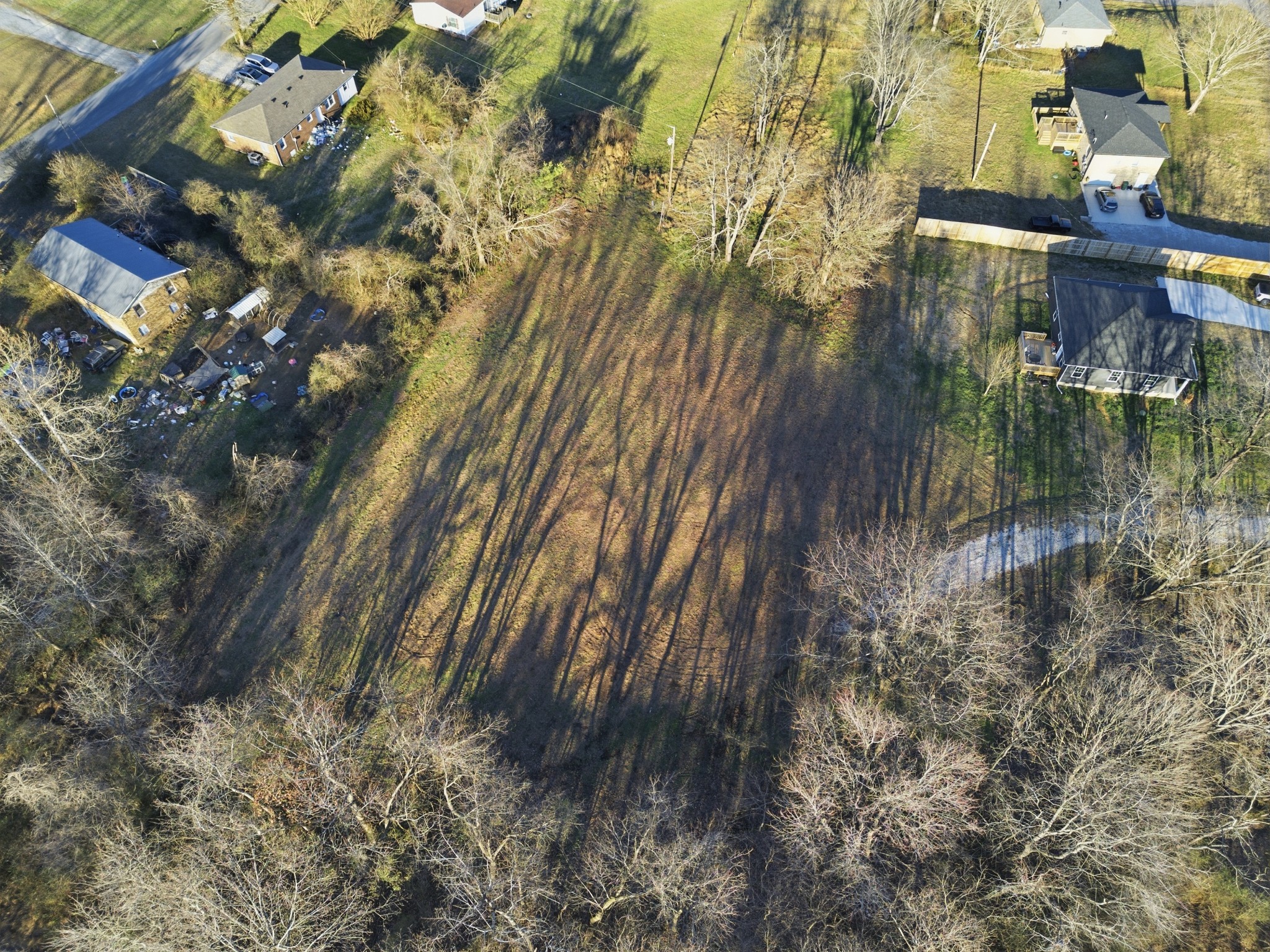 0 Rambaugh Burns, TN 37029 - Photo 10 of 21 a backyard of a house with lots of green space